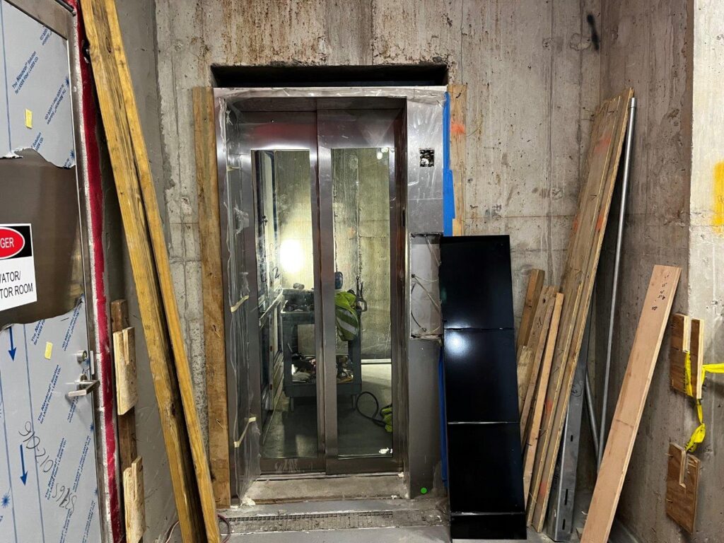 Elevator installation is ongoing.